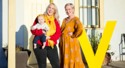 two-women-and-one-baby-standing-outside-home-with-vantage-west-yellow-v