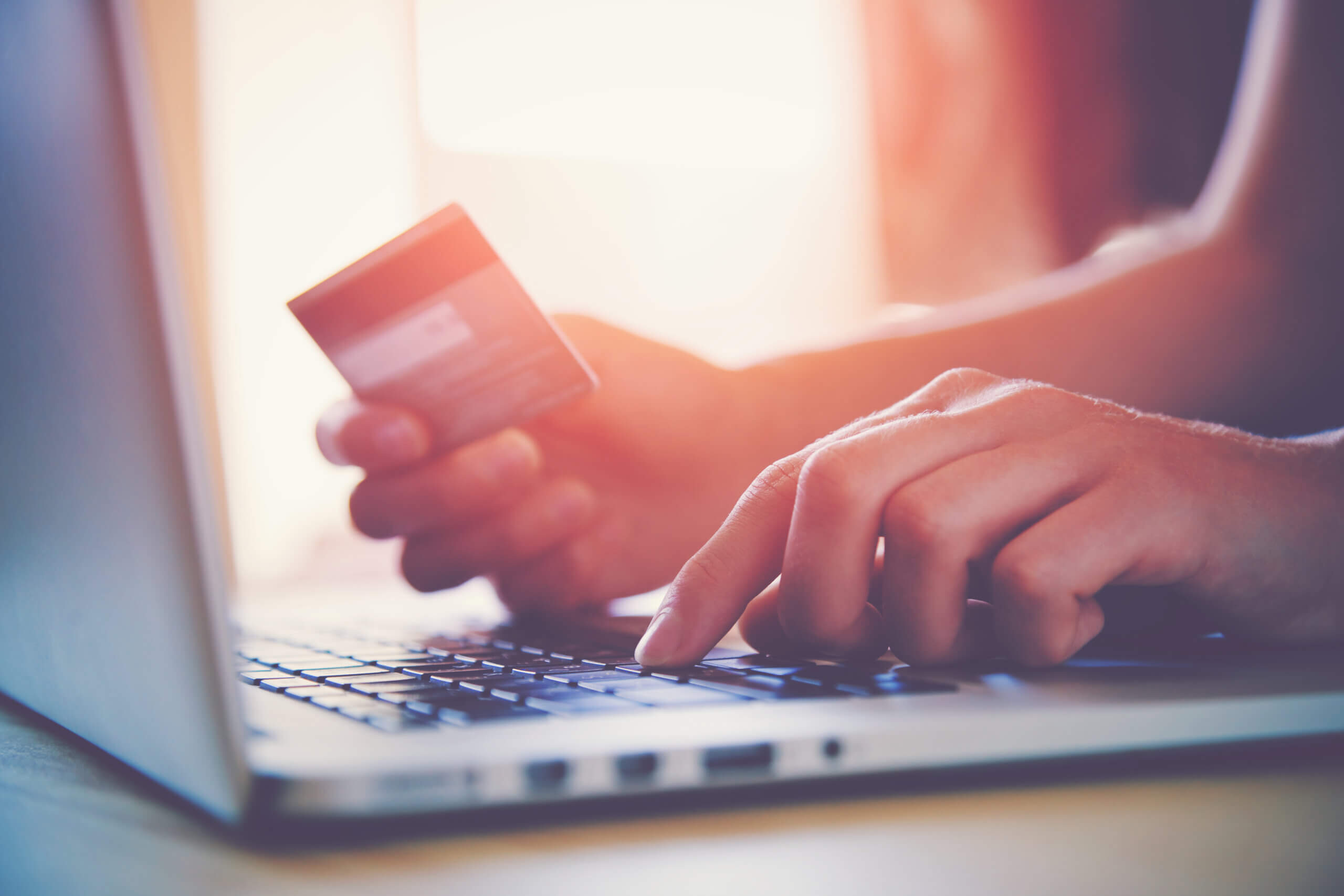 Person using online banking on a laptop