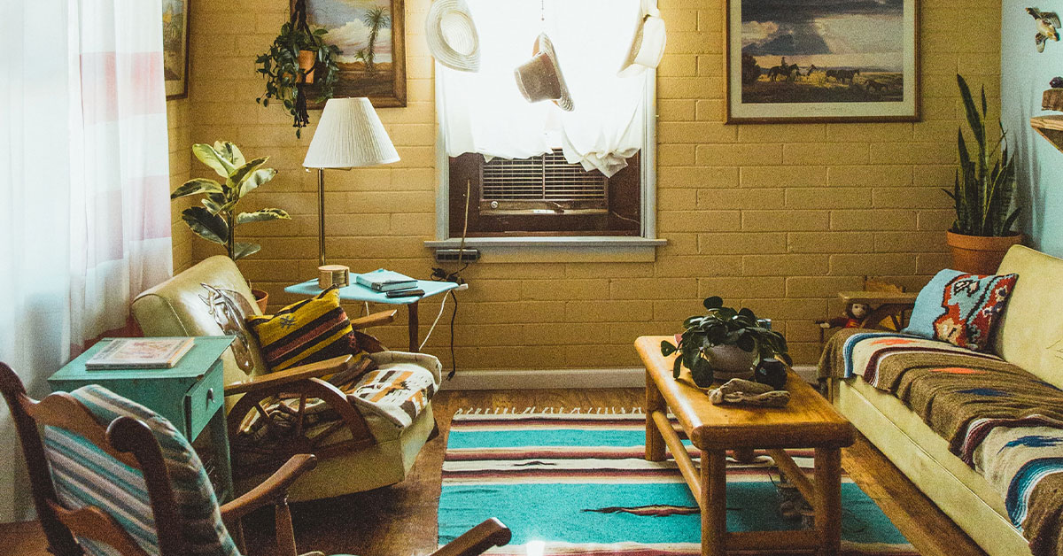 Indoor/outdoor space with rattan chair and hammock